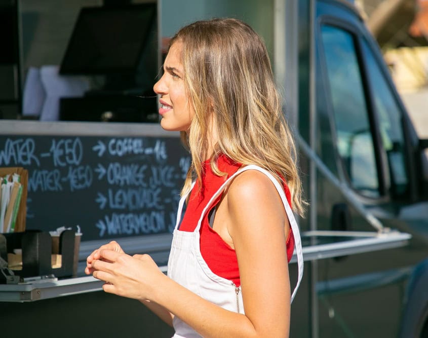 lady at the food truck ready to order