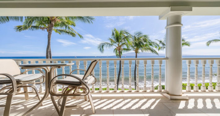 private lanai with seating and views of the Pacific Ocean