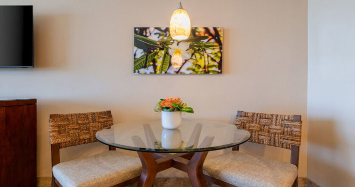 two person dining area with light fixture above